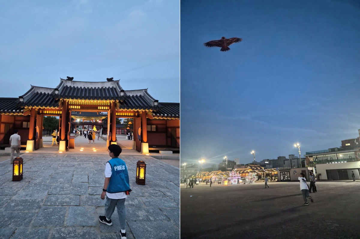 방문객이 화성행궁 야간개장 입구로 들어서고 광장에서는 연을 날리는 체험이 함께 펼쳐지고 있다.